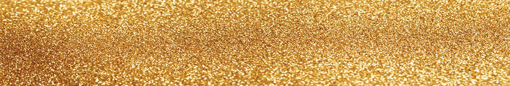 Abstract bokeh background with shining gold glitters.