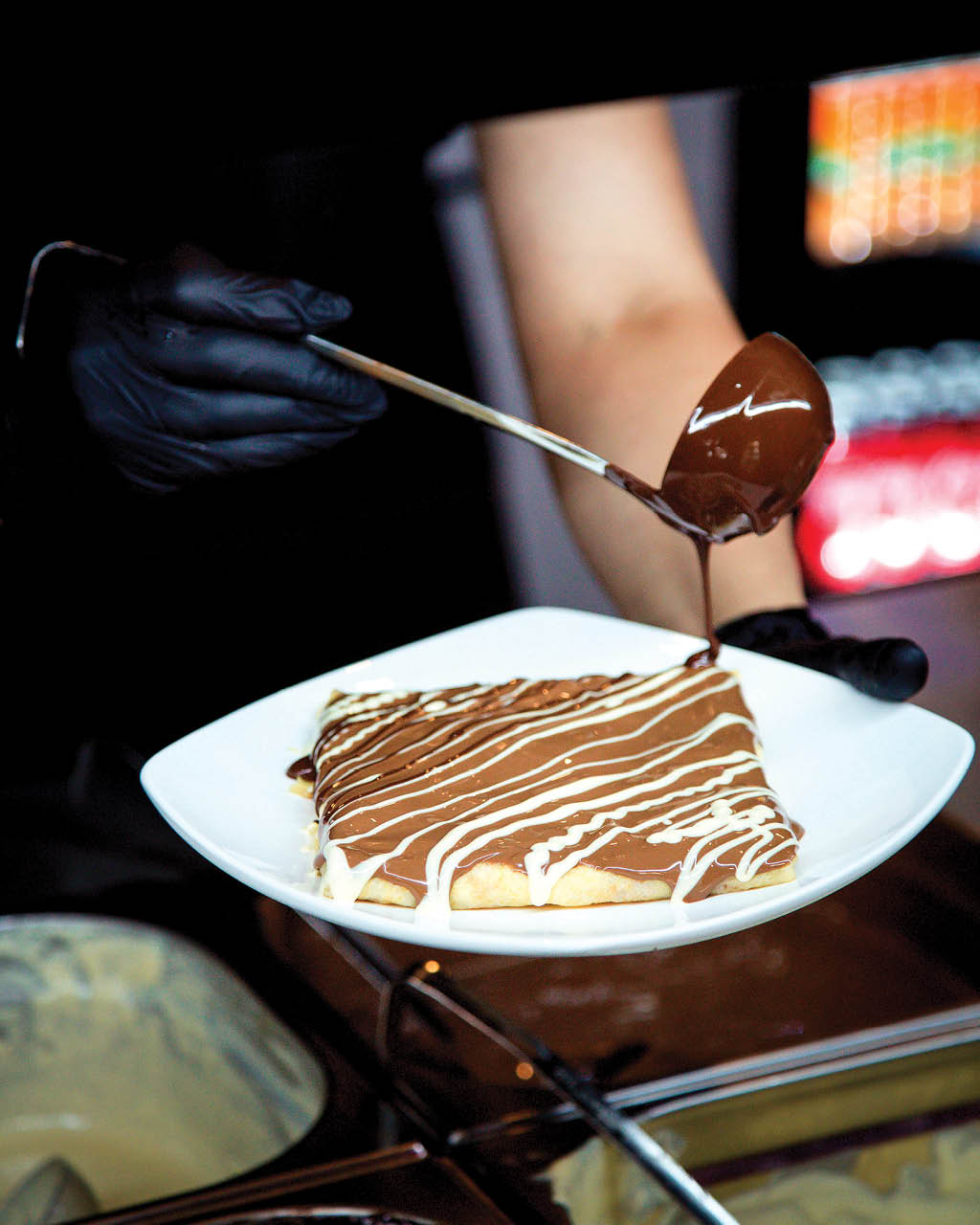 pancake watered with chocolate syrup
