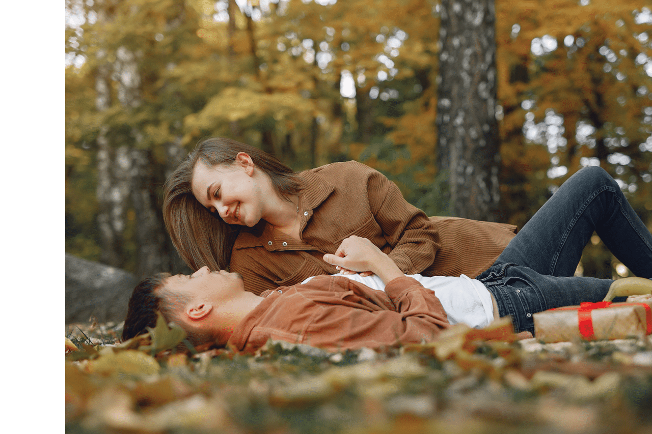 Couple in a park  Guy in a brown shirt  Golden autumn 