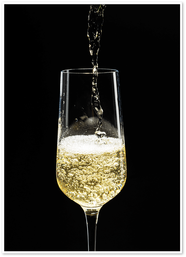 Champagne pouring into a glass