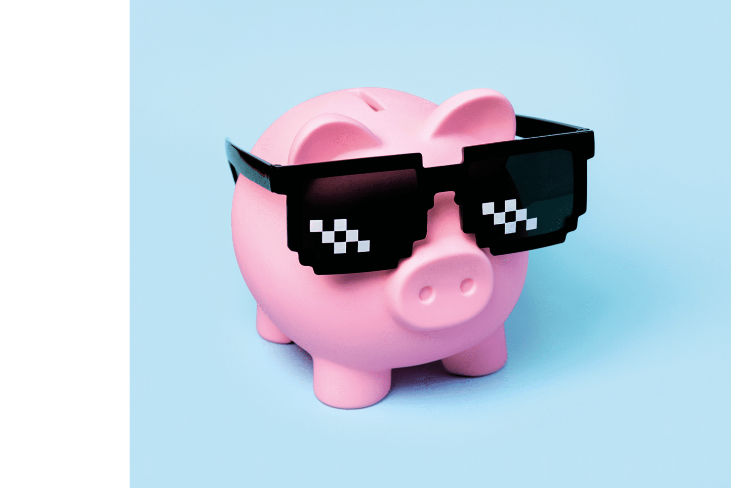 Pink piggy money bank with black sunglasses on a blue background
