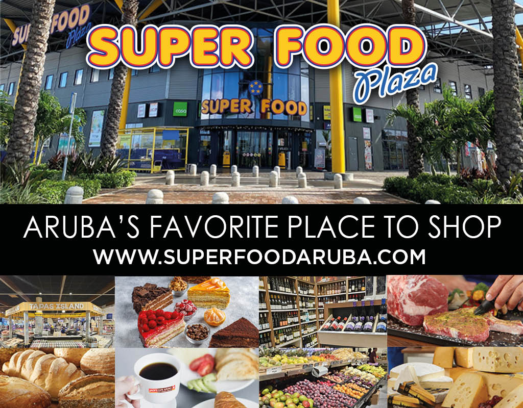 Fachada de supermercado Super Food Plaza con texto que promociona como el lugar favorito para comprar en Aruba y varias im genes peque as de productos frescos y alimentos variados. Descripci n generada con IA